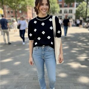 Stylish Black Top with White Floral Design